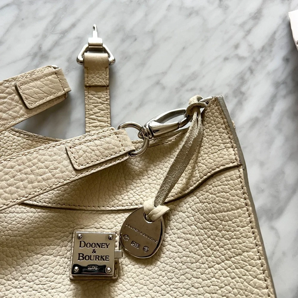 Dooney & Bourke Pebbled Leather Cream Shoulder Bag Duck Medallion Ivory